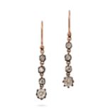 A PAIR OF ANTIQUE DIAMOND DROP EARRINGS in yellow gold and silver, each set with a row of graduat...