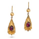A PAIR OF GARNET DROP EARRINGS in yellow gold, each set with an oval cabochon garnet, accented by...