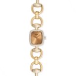 HERMES - A LADIES HERMES WRISTWATCH in 18ct gold, 509210, 38263, the barrel shaped champagne dial...