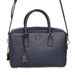 PRADA SAFFIANO NAVY BRIEFCASE BAG Condition grade A. 30cm long, 20cm high. Adjustable crossbody...