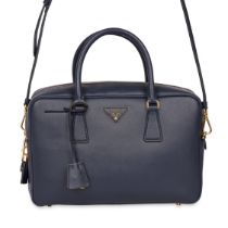 PRADA SAFFIANO NAVY BRIEFCASE BAG Condition grade A. 30cm long, 20cm high. Adjustable crossbody...