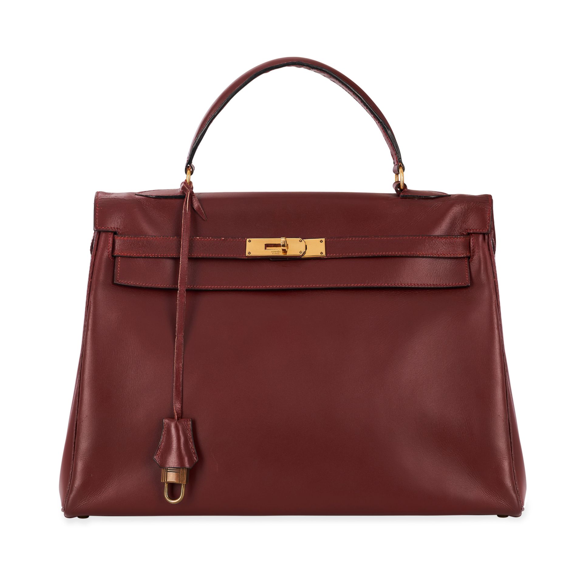 HERMÈS VINTAGE BURGUNDY KELLY 35 BAG Condition grade C.  35cm long, 25cm high. Top handle drop ...