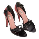 PRADA BLACK AND CORAL FLOWER HEELS Condition grade B-. Size 36. Heel height 10cm. Black and cor...