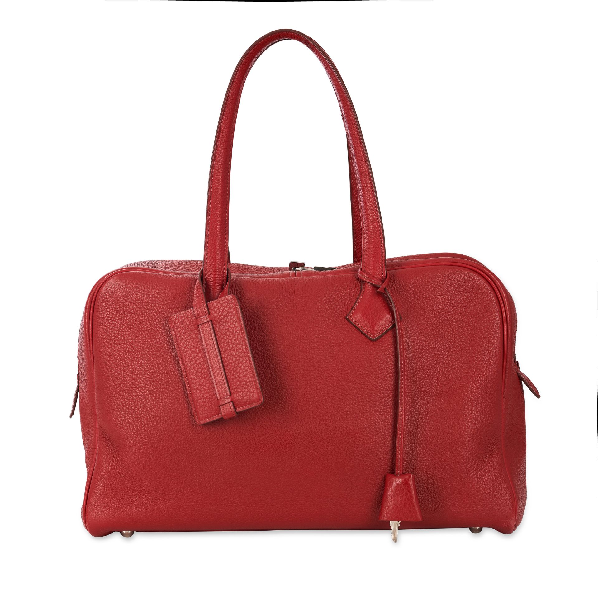 HERMÈS RED VICTORIA TOP HANDLE BAG Condition grade B-. 40cm long, 25cm high. 21cm top handle dr...