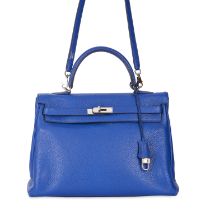 HERMÈS BLEU ELECTRIQUE RETOURNE KELLY 35 Condition grade B+. 35cm long, 25cm high. 40cm shoulde...