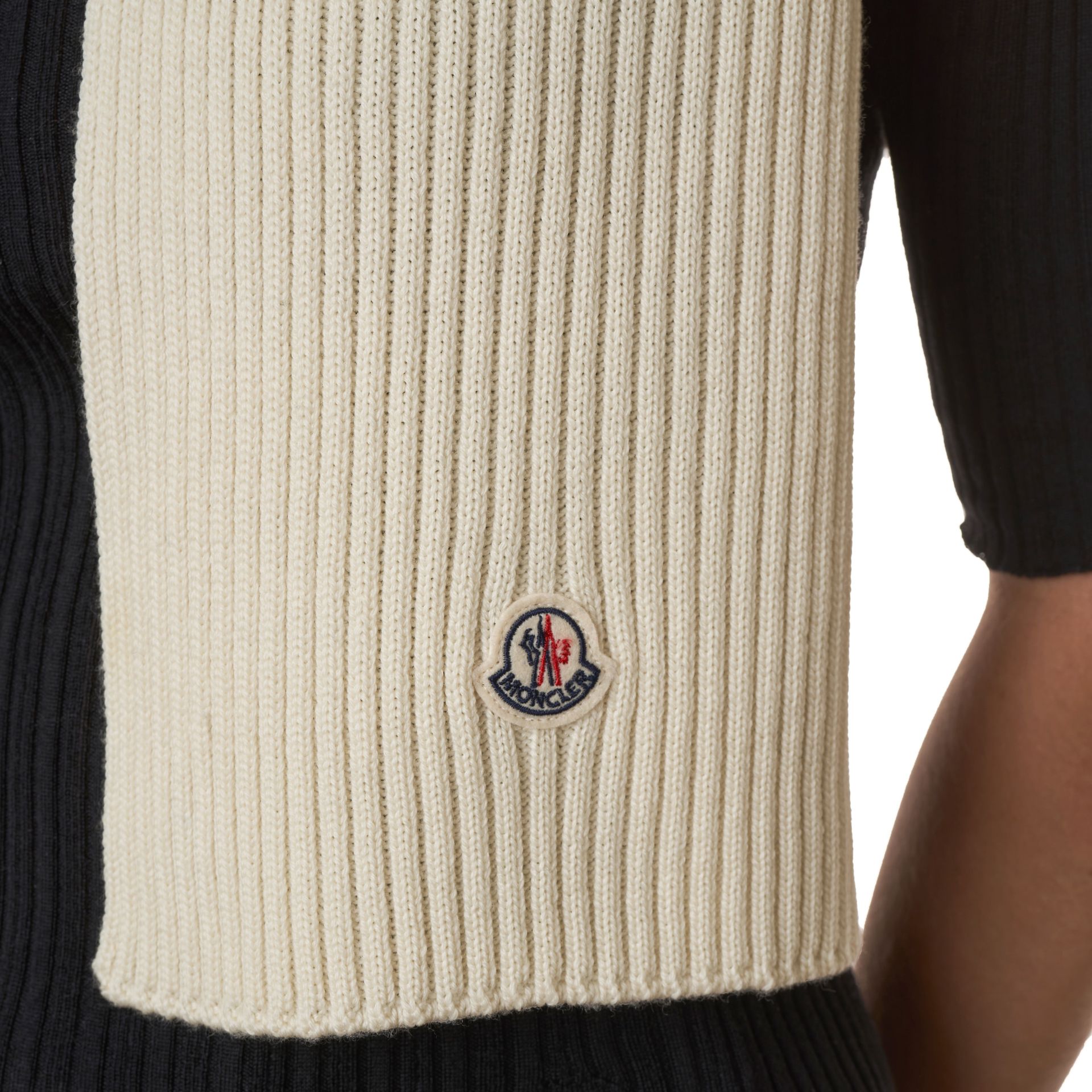 MONCLER IVORY RIBBED SCARF Condition grade B. 130cm long, 20cm wide. Ivory toned ribbed scarf w... - Image 2 of 3