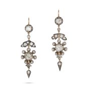 A PAIR OF ANTIQUE DIAMOND DROP EARRINGS in yellow gold and silver, each set with an old cut diamo...