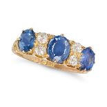 AN ANTIQUE SAPPHIRE AND DIAMOND RING in 18ct yellow gold, set with three cushion cut sapphires ac...