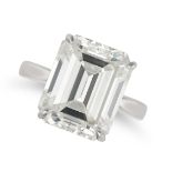 A FINE 10.03 CARAT SOLITAIRE DIAMOND ENGAGEMENT RING in 18ct white gold set with an emerald cut d...