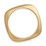 TIFFANY & CO., A VINTAGE GOLD BANGLE in 18ct yellow gold, designed as a cushioned square, signed ...