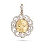 A FINE CEYLON NO HEAT YELLOW SAPPHIRE AND DIAMOND PENDANT in yellow gold and silver, set to the c...