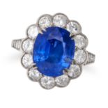 A BURMA NO HEAT SAPPHIRE AND DIAMOND CLUSTER RING set with a cushion cut sapphire of 4.96 carats,...