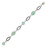 AN ANTIQUE ART DECO FRENCH AMAZONITE, ONYX AND DIAMOND BRACELET in 18ct white gold, comprising a ...