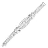 AN IMPORTANT DIAMOND BRACELET in platinum, set with a graduating row of emerald cut diamonds, the...