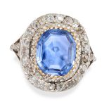 AN ANTIQUE CEYLON NO HEAT SAPPHIRE AND DIAMOND CLUSTER RING in yellow gold and silver, set with a...