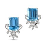 A PAIR OF AQUAMARINE AND DIAMOND CLIP EARRINGS in platinum, each set with an octagonal step cut a...