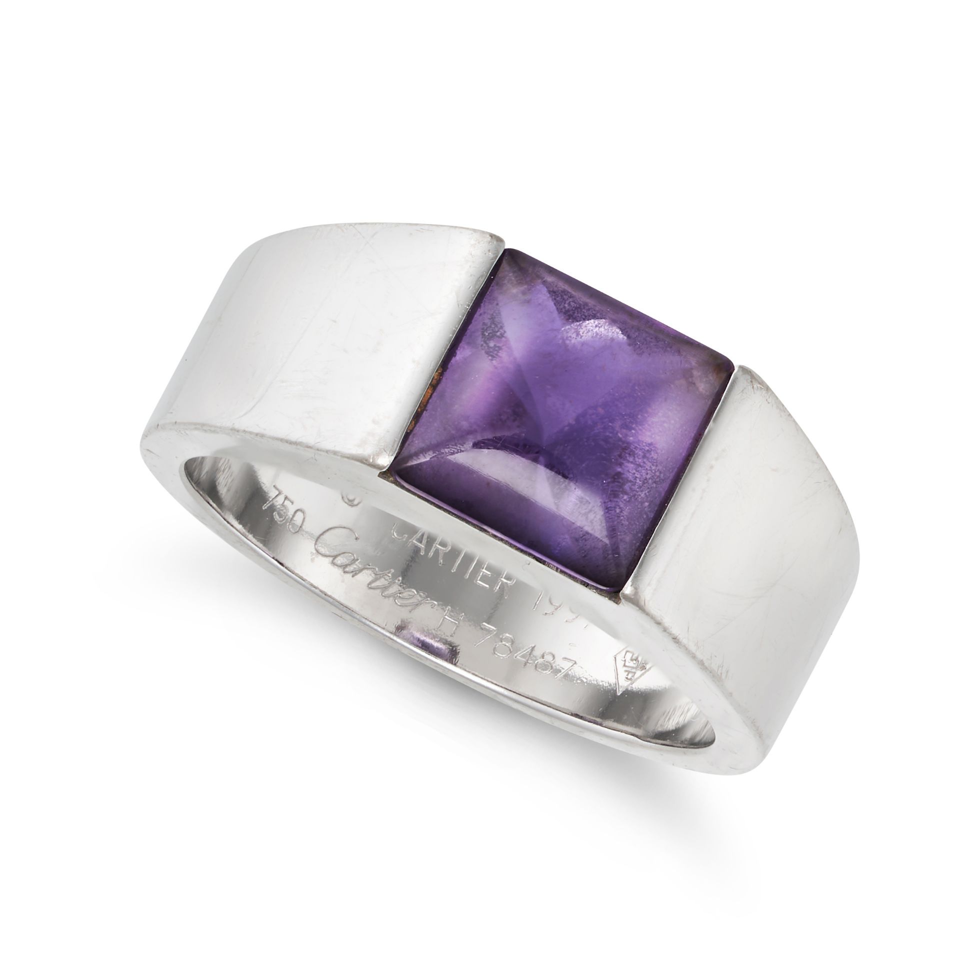 CARTIER, AN AMETHYST TANK RING, 1997 in 18ct white gold, set with a square buff top cabochon amet...