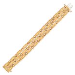 TIFFANY & CO., A GOLD TIFFANY SIGNATURE BRACELET, 1992 in 18ct yellow gold, comprising three rows...