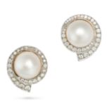 A PAIR OF PEARL AND DIAMOND EARRINGS in yellow gold, each set with a mabe pearl in a border of ro...