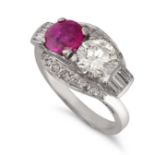 A RUBY AND DIAMOND TOI ET MOI RING in platinum, set with a round cut ruby of approximately 0.70 c...