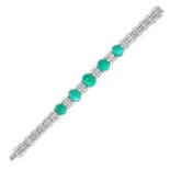 A COLOMBIAN EMERALD AND DIAMOND BRACELET in platinum, set with rows of single and baguette cut di...