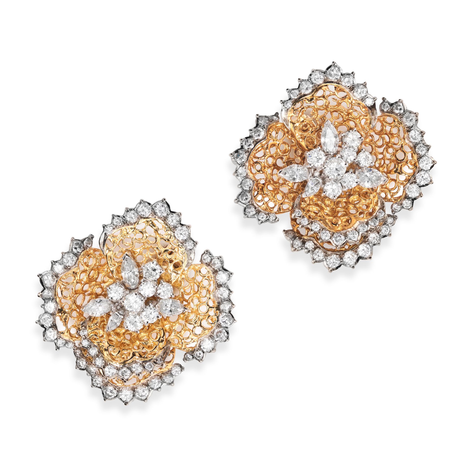 KUTCHINSKY, A MODERNIST PAIR OF DIAMOND FLOWER CLIP EARRINGS, 1971 in 18ct yellow and white gold,...