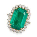 A FINE COLOMBIAN EMERALD AND DIAMOND CLUSTER RING in 18ct yellow gold, set with an octagonal step...