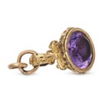 NO RESERVE - AN ANTIQUE FOB SEAL the fob set with round cut amethyst, accented by a cross motif, ...