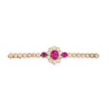 AN ANTIQUE RUBY AND DIAMOND BAR BROOCH in yellow gold, set with an oval cut ruby in a cluster of ...
