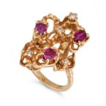 A MODERNIST RUBY AND DIAMOND RING in 14ct yellow gold, set with three oval cut rubies, accented b...