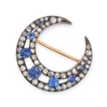 AN ANTIQUE SAPPHIRE AND DIAMOND CRESCENT MOON BROOCH in yellow gold and silver, designed as a cre...