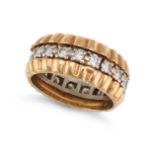 A DIAMOND BAND RING in yellow gold, set all around with a row of round brilliant cut diamonds, no...