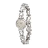 PATEK PHILIPPE - A LADIES DIAMOND PATEK PHILIPPE COCKTAIL WATCH in 18ct white gold, the silvered ...
