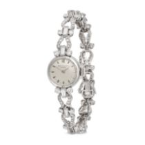 PATEK PHILIPPE - A LADIES DIAMOND PATEK PHILIPPE COCKTAIL WATCH in 18ct white gold, the silvered ...