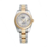 ROLEX - A LADIES BIMETAL ROLEX OYSTER PERPETUAL DATEJUST WRISTWATCH in yellow gold and stainless ...