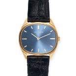 PATEK PHILIPPE - A PATEK PHILIPPE HORIZONTAL ELLIPSE in 18ct yellow gold, 3845, the oval blue sun...