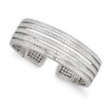 A DIAMOND BANGLE in 18ct white gold, the open cuff bangle with hinged mechanism, set with five ro...