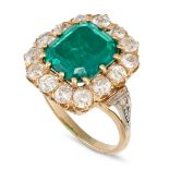 LOT WITHDRAWN - AN EMERALD DOUBLET AND DIAMOND CLUSTER RING in yellow gold and platinum, set with...