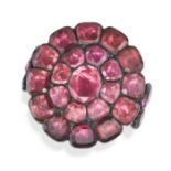 AN ANTIQUE GARNET CLUSTER RING, 18TH CENTURY in yellow gold and silver, set with a cluster of fla...