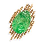 A JADEITE JADE DRESS RING in 14ct yellow gold, the modernist ring set with a slice of carved jade...
