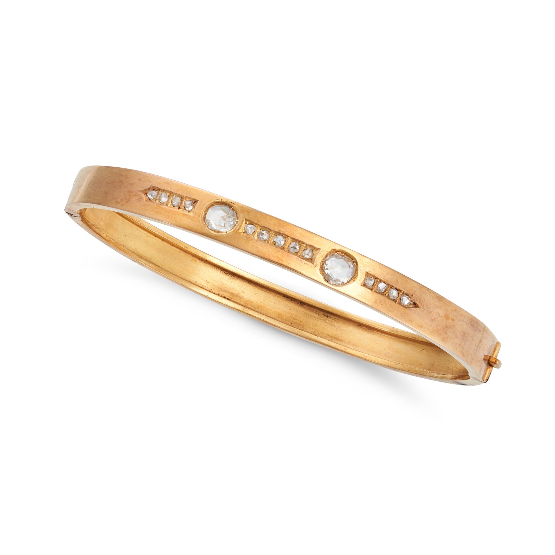 AN ANTIQUE DIAMOND BANGLE in yellow gold, the hinged bangle set with two principal rose cut diamo...