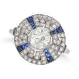 A DIAMOND AND SAPPHIRE TARGET RING in platinum, set with an old European cut diamond of approxima...