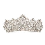 A PASTE TIARA set with clusters of paste stones, accented throughout with round, cushion, and hal...