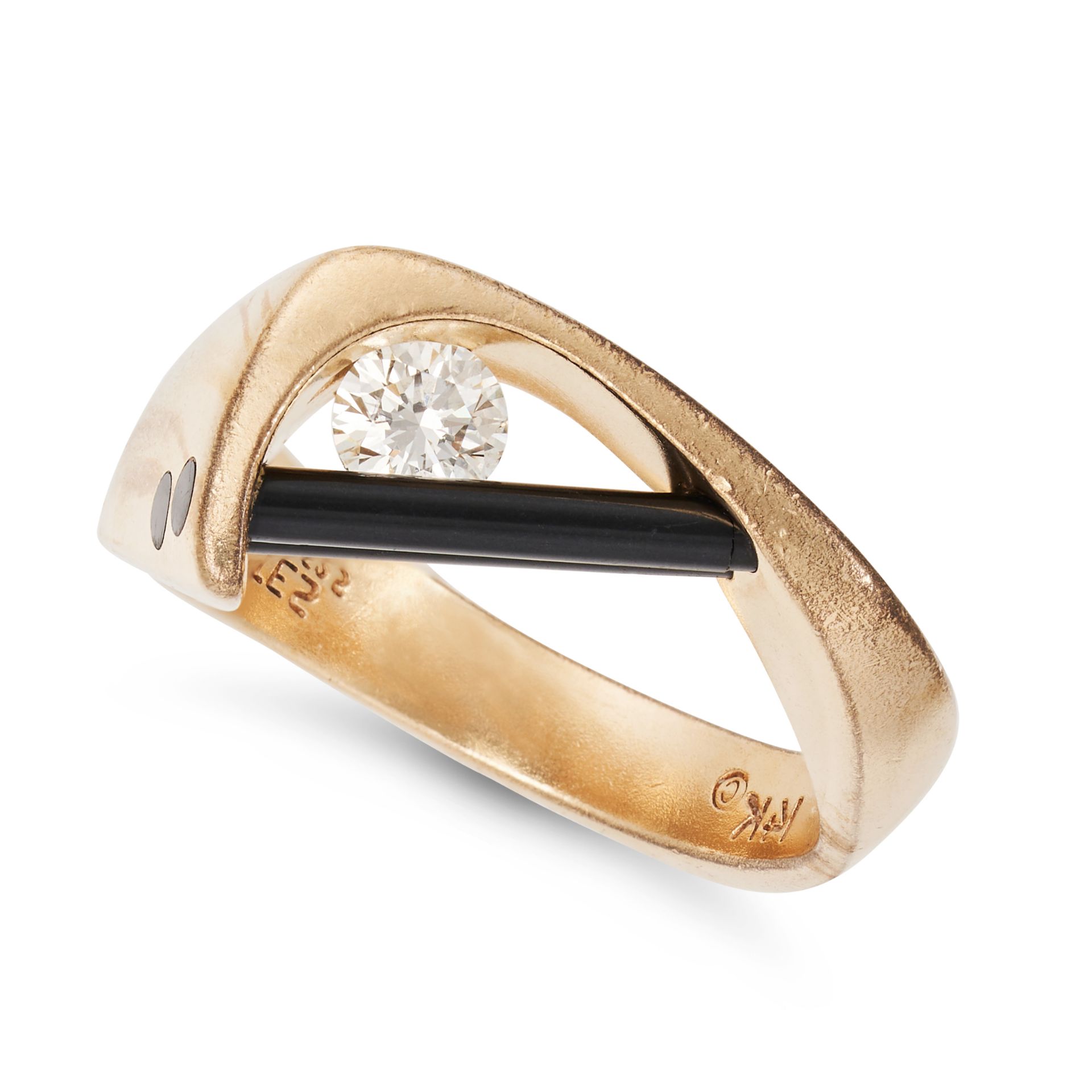 AN ONYX AND DIAMOND DRESS RING in 14ct yellow gold, set with a round brilliant cut diamond and tw...
