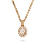 CHOPARD, A HAPPY DIAMOND PENDANT in 18ct yellow gold, the oval pendant with a free moving round b...