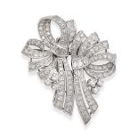 A DIAMOND DOUBLE CLIP BROOCH, 1940S in platinum, in scrolling design, set throughout with round b...