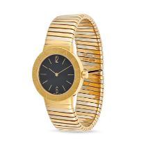 BULGARI, A LADIES TUBOGAS WRISTWATCH in 18ct yellow and white gold, model ref BB 30 2T, black fac...