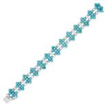 A TURQUOISE AND DIAMOND BRACELET in 18ct white gold, set with clusters of round cabochon turquois...