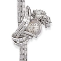 JAEGER LECOULTRE, A LADIES DIAMOND COCKTAIL WATCH in platinum, the silvered dial with dot and arr...