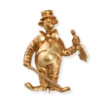 KUTCHINSKY, A VINTAGE CLOWN BROOCH in 18ct yellow gold, designed as a clown playing the violin, s...
